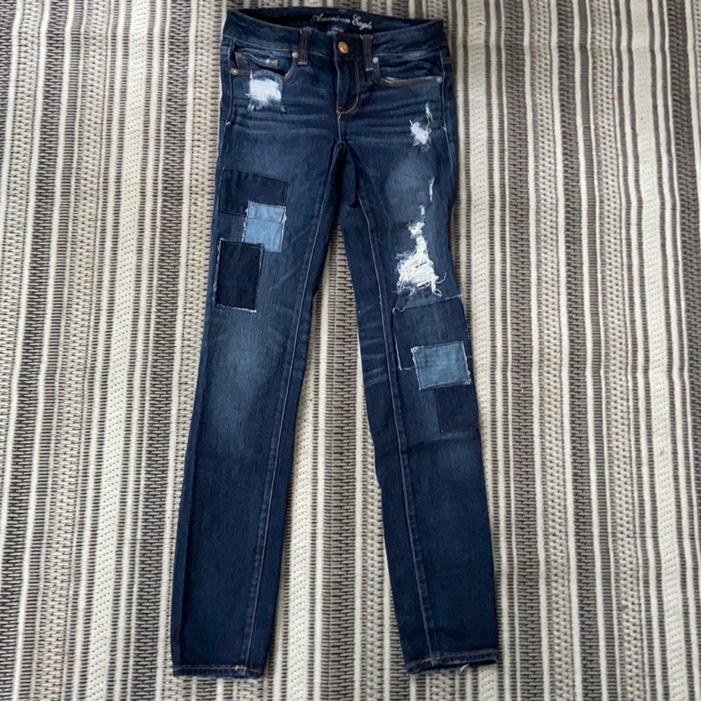 Distressed patchwork American eagle jeans